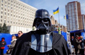 "Darth Vader", the leader of the Internet Party of Ukraine, stands during a rally in front of the Ukrainian Central Elections Commission in Kiev April 3, 2014. "Darth Vader" has submitted documents to the Ukrainian Central Elections Commission to register as a candidate for Ukraine's May 25 presidential election. REUTERS/Shamil Zhumatov (UKRAINE - Tags: POLITICS ELECTIONS CIVIL UNREST) - RTR3JT2U