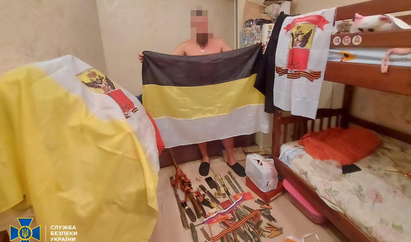 Імперський прапор і символіка «Одеської дружини»: СБУ затримала ворожого агента (фото) «фото»